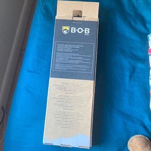 Handlebar console and tire pump for strollers